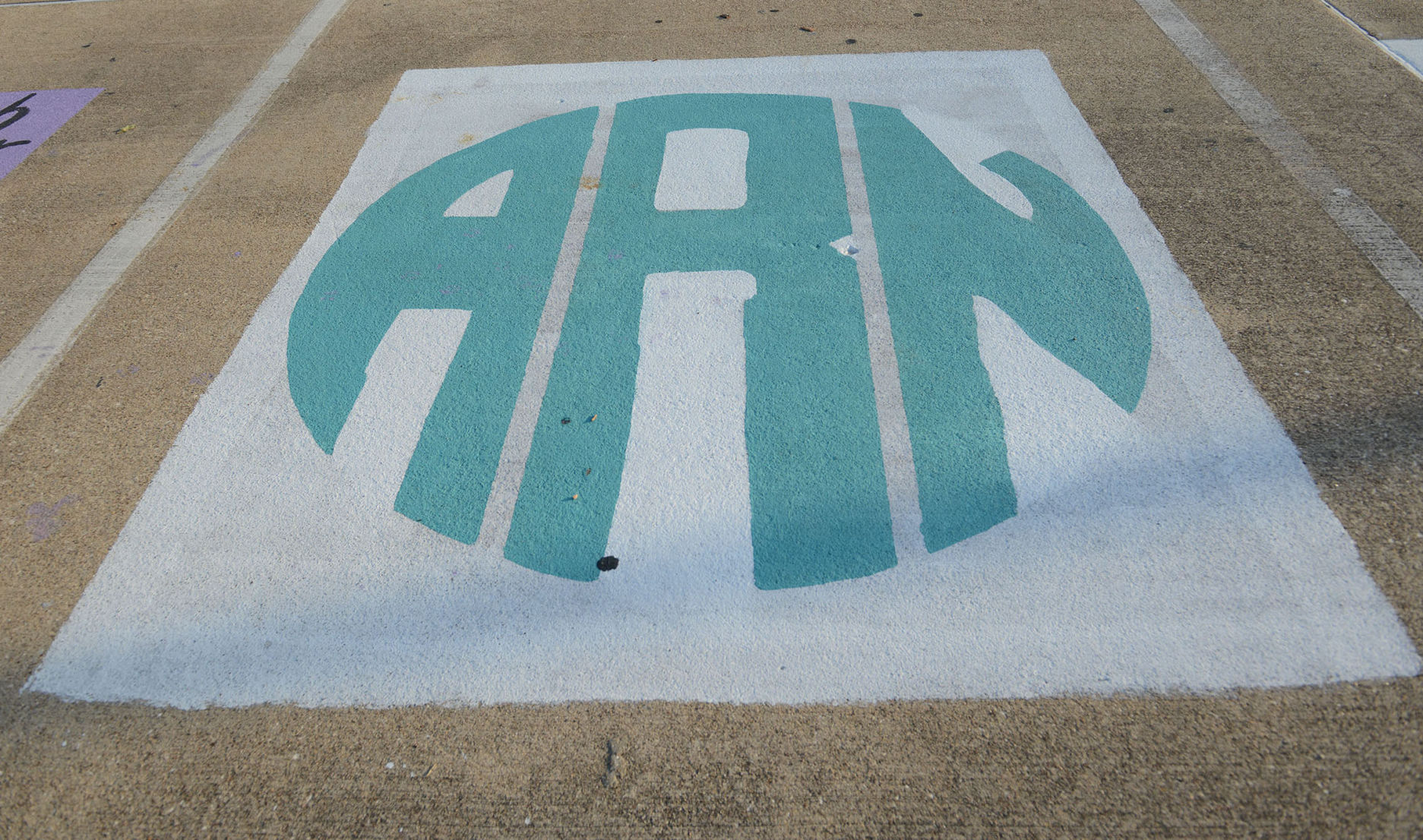 A&M Consolidated HS painted parking spots